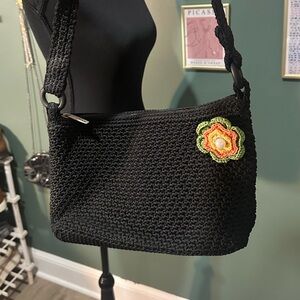 The Sak Black Crochet Shoulder Bag with Crochet Flower Pin